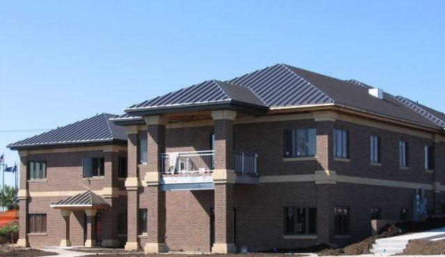 Commercial brick building with precast banding and columns